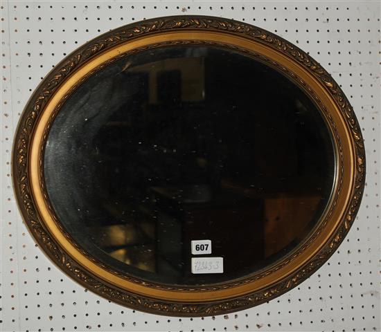 Gilt oval frame wall mirror(-)